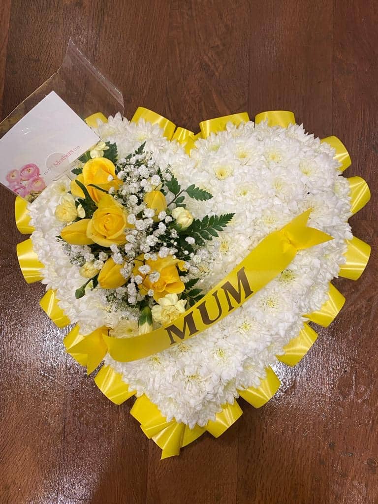 bright based heart of flowers