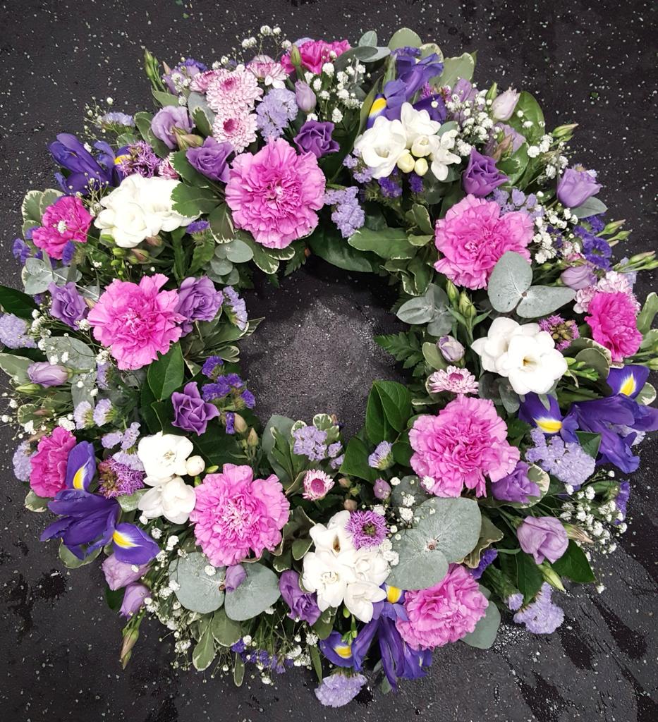 purple and white wreath