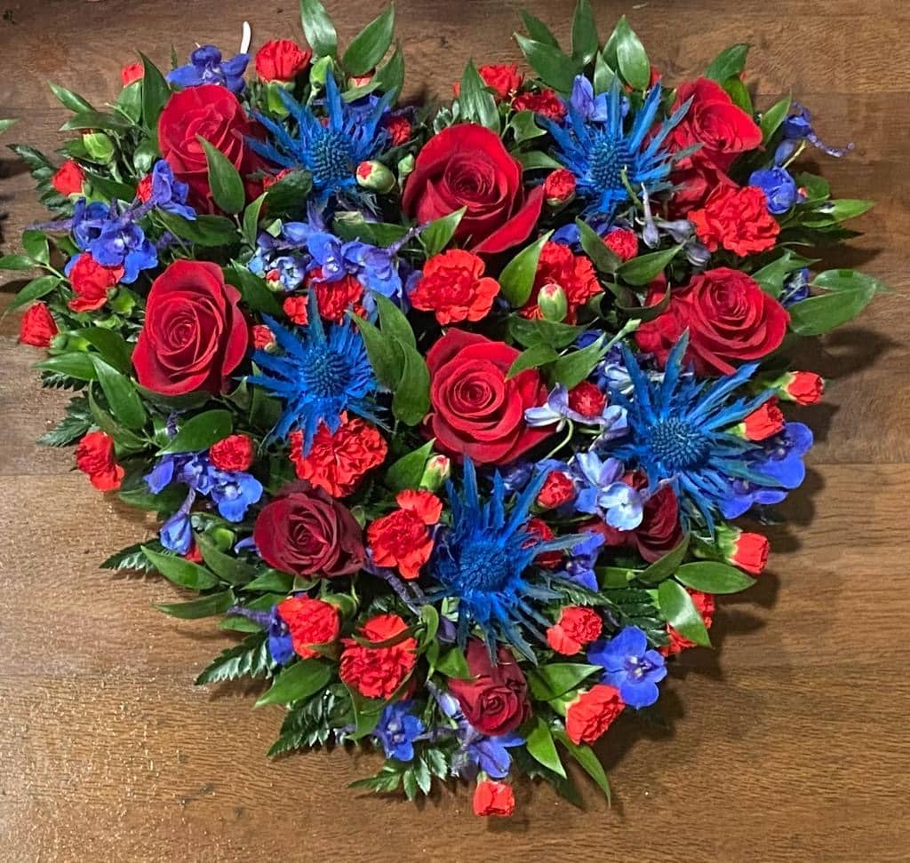 red and blue heart of flowers