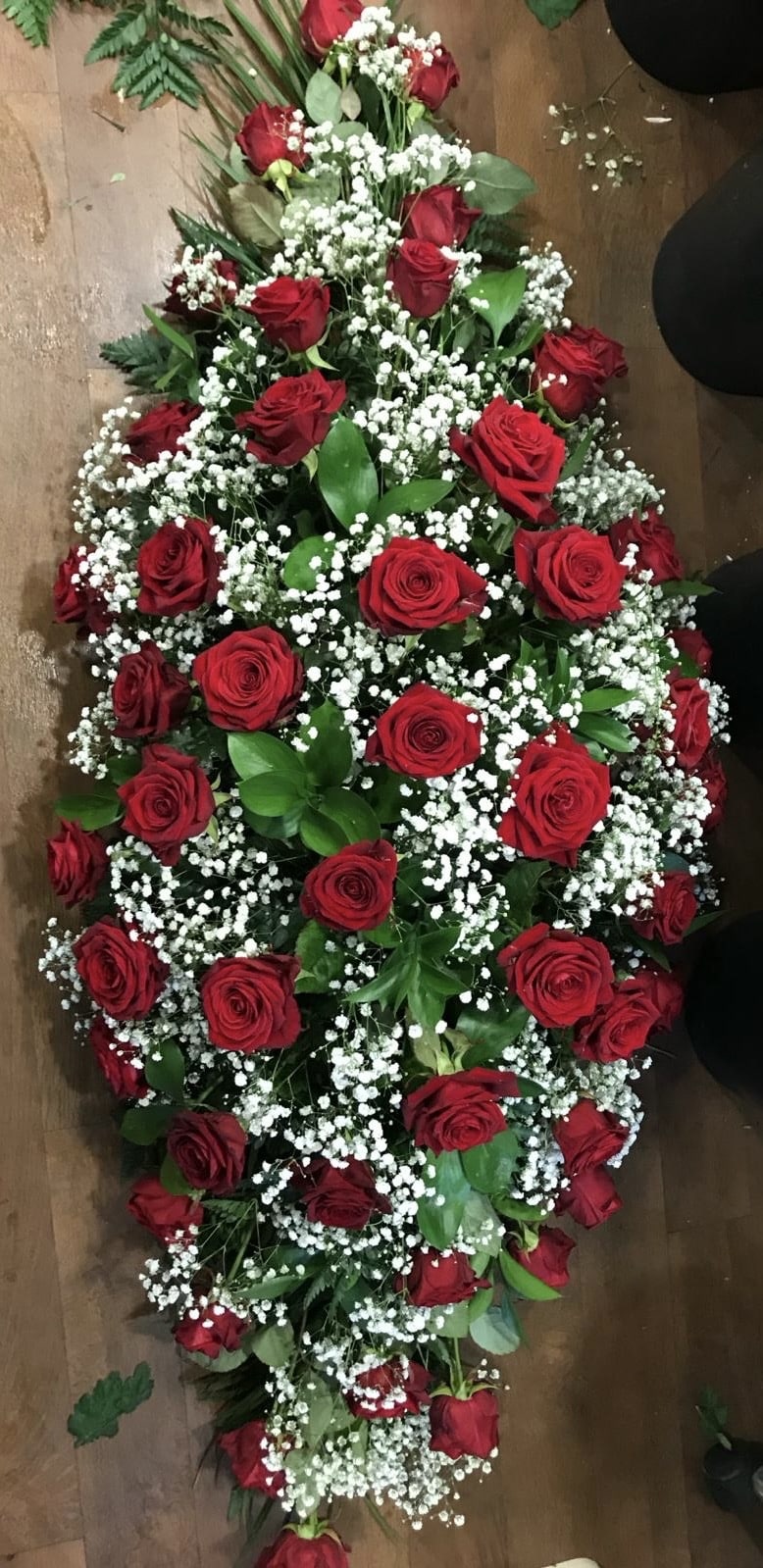 red rose gypsophilia casket spray