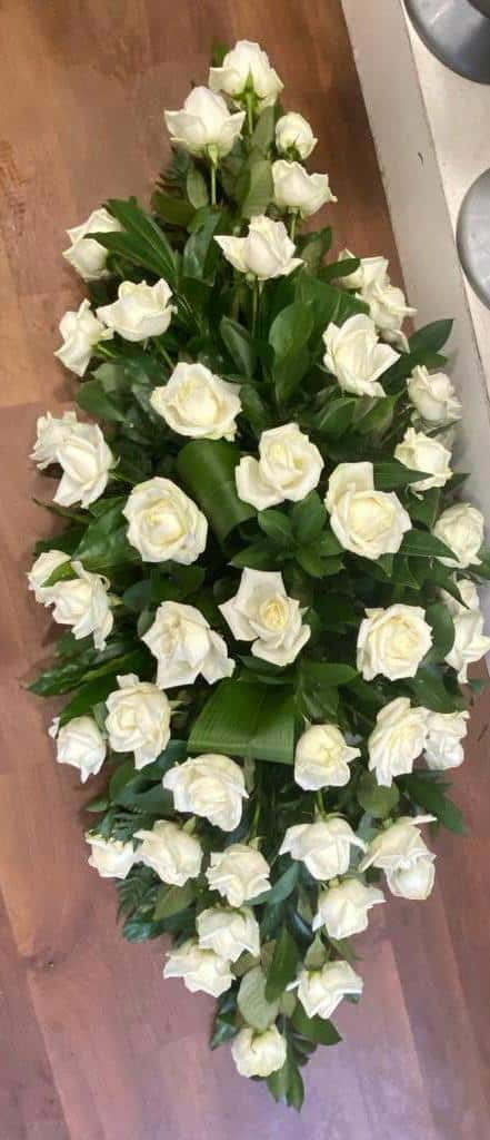 white rose casket spray