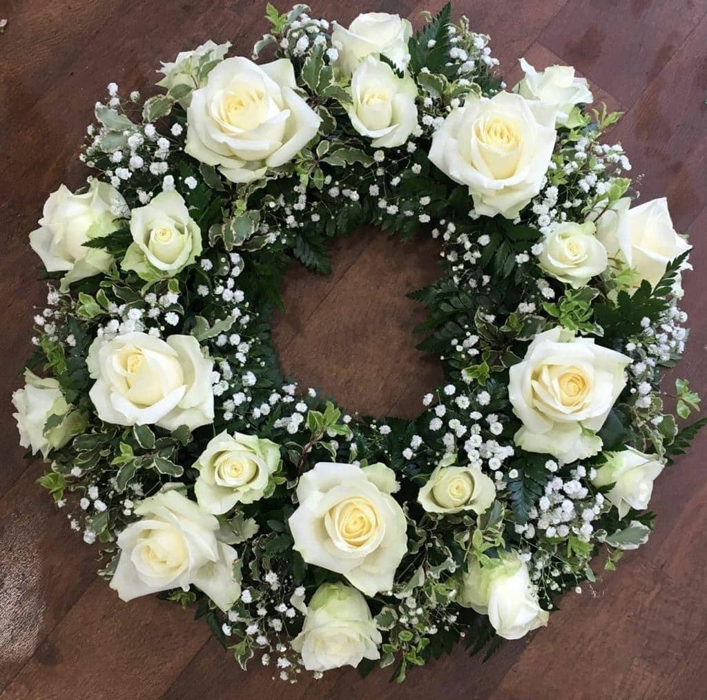 white rose and gypsophila wreath